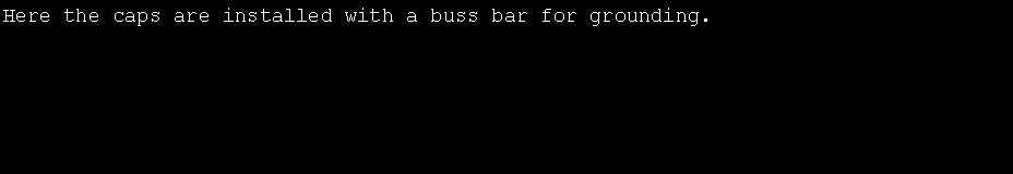 Text Box: Here the caps are installed with a buss bar for grounding.
